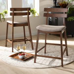 Load image into Gallery viewer, Baxton Studio Larine Modern And Contemporary Light Grey Fabric Upholstered Walnut Finished 2-Piece Wood Counter Stool Set
